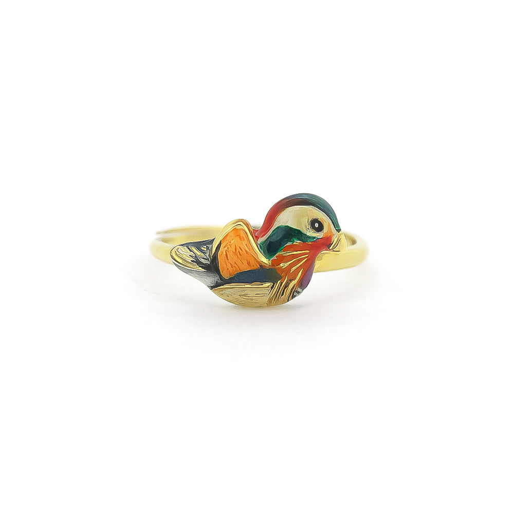 A gold rings featuring colorful, intricately designed a mandarin duck design.