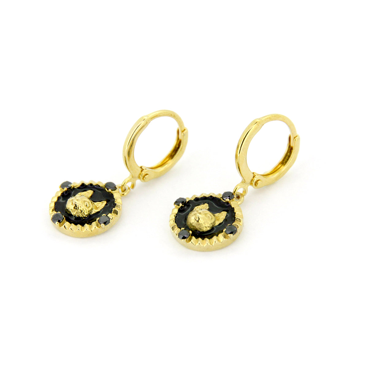 Beautiful gold earrings featuring a cat face motif surrounded by a black circular design.