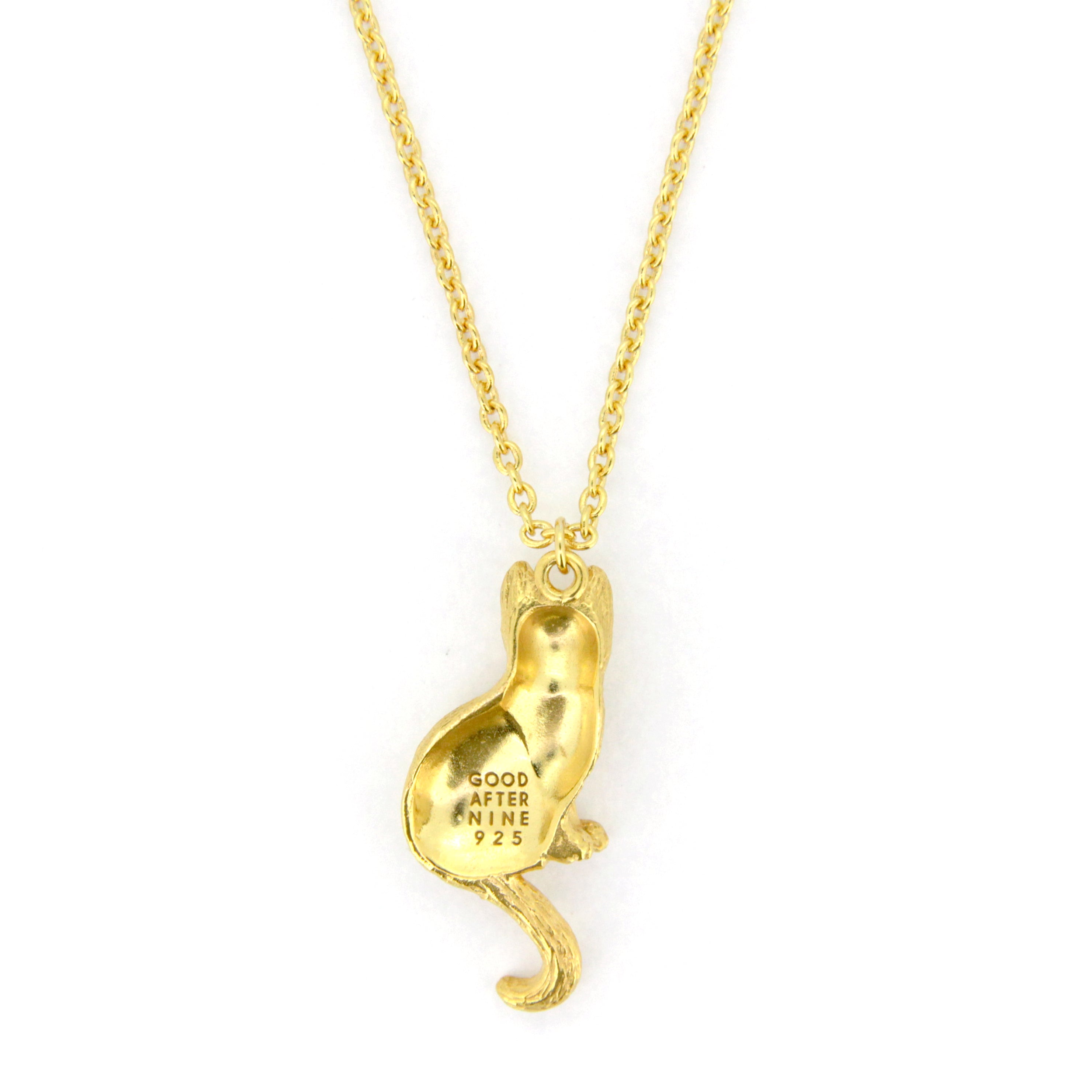 Unique gold pendant necklace featuring a setting cat design, perfect for animal lovers.