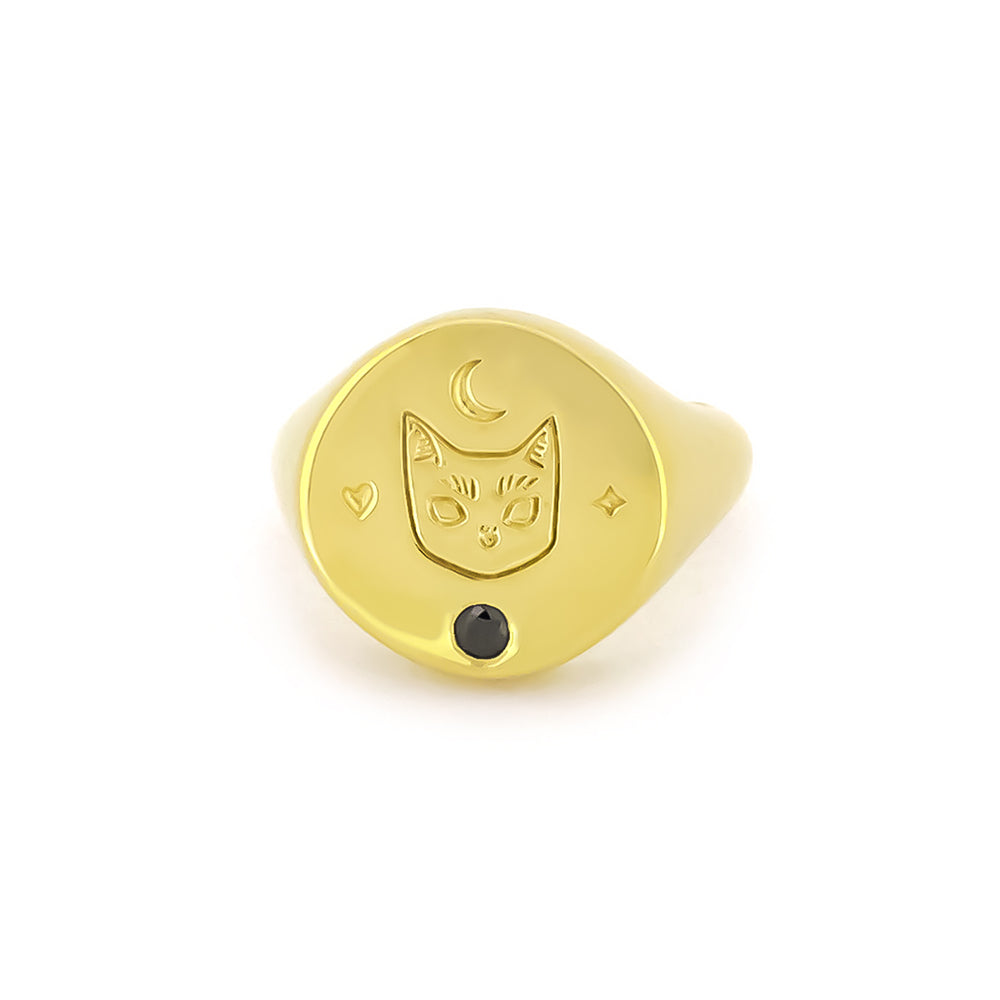 Charming gold signet ring featuring a cat design with a synthetic black gemstone and moon motifs.