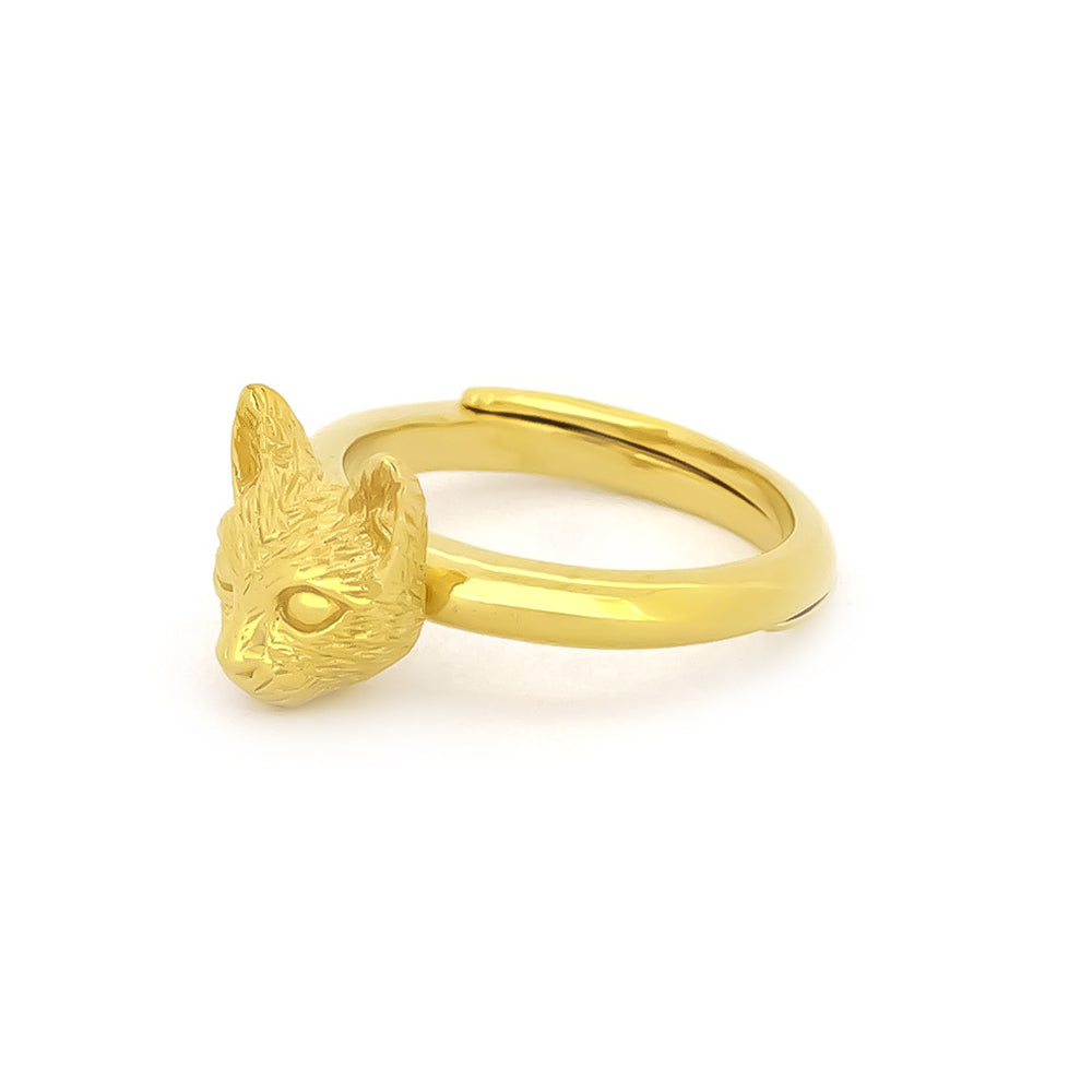 Beautiful gold ring with a cat head design, featuring detailed facial features.