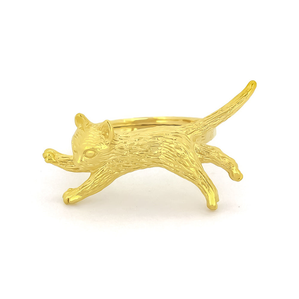 Charming gold ring featuring a sleeping cat design, perfect for animal lovers.