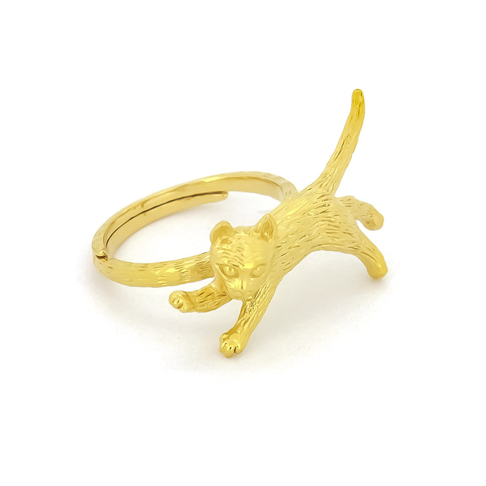 Charming gold ring featuring a sleeping cat design, perfect for animal lovers.