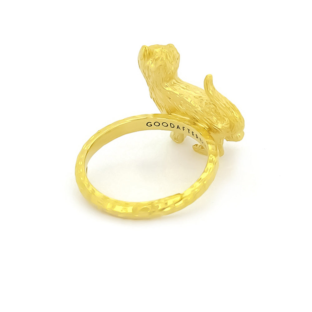 A whimsical gold ring featuring a standing cat with detailed fur texture, perfect for animal lovers.