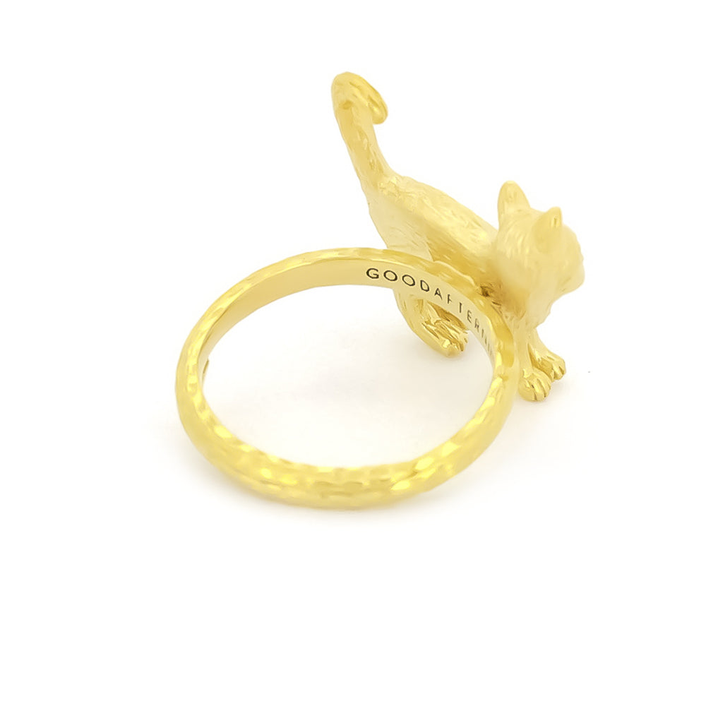 A whimsical gold ring featuring a standing cat design, highlighting the fur's details and facial features.