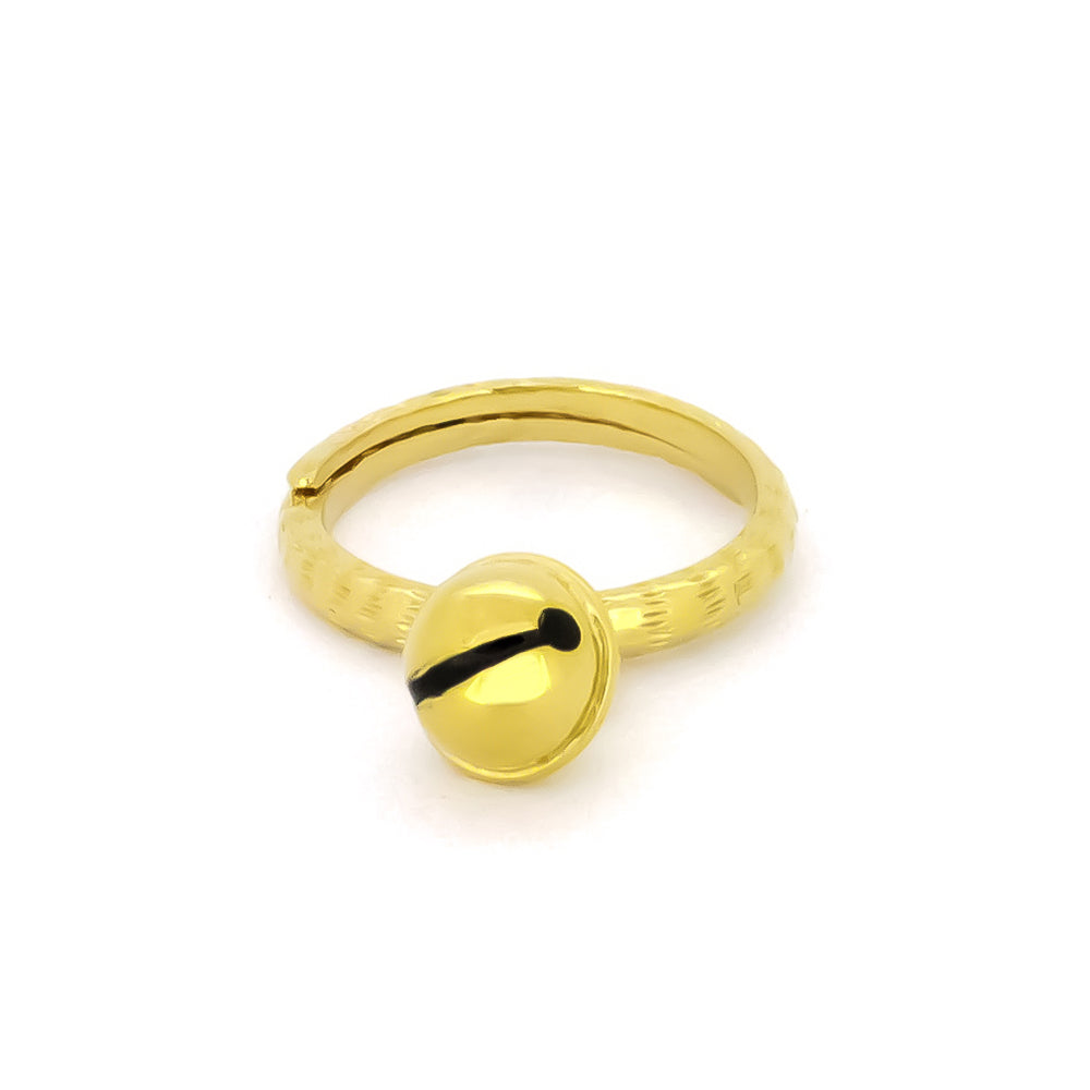 A gold ring featuring a small cat bell charm. 