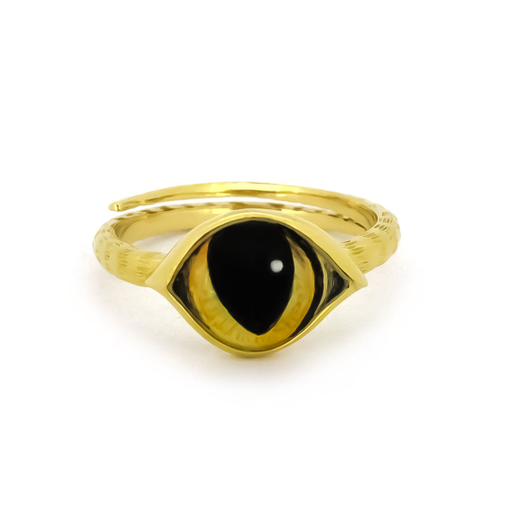 Unique gold ring designed to resemble a cat's eye, perfect for cat lovers.