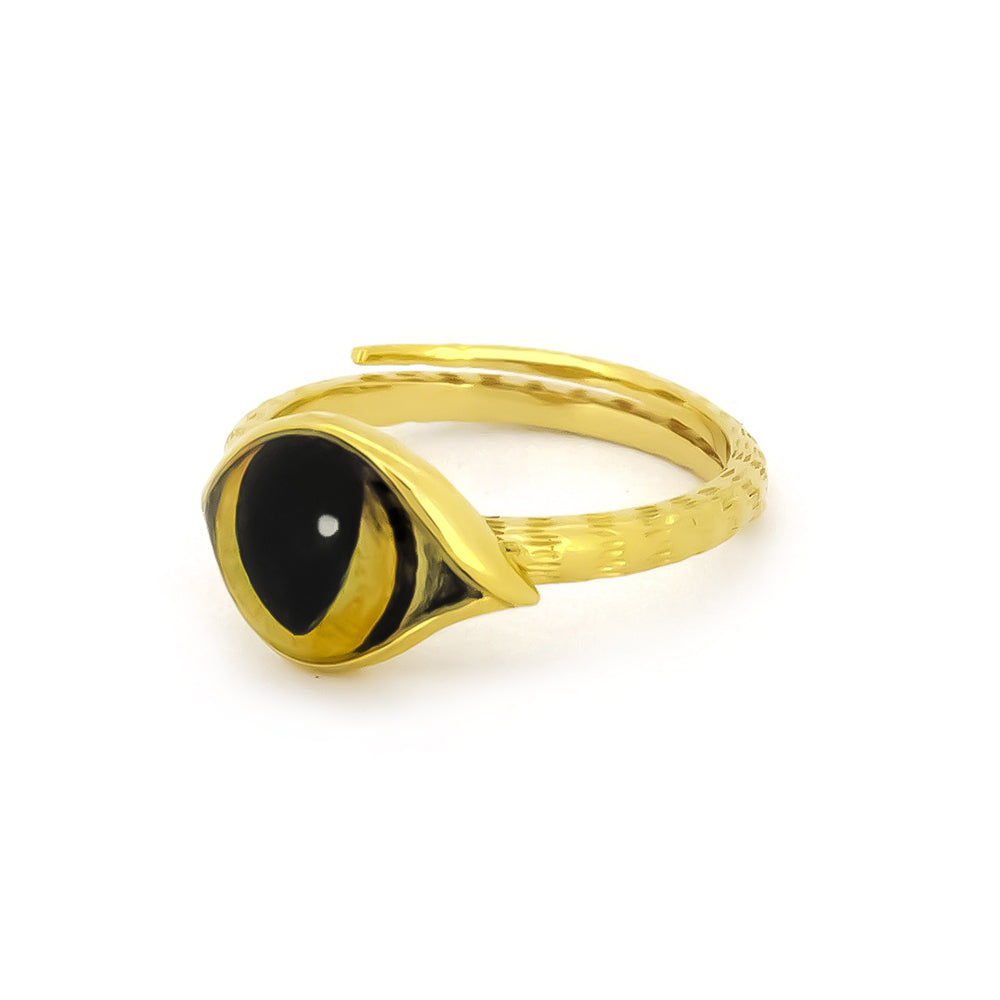 Unique gold ring designed to resemble a cat's eye, perfect for cat lovers.