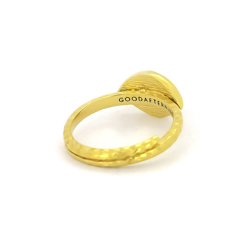 Unique gold ring designed to resemble a cat's eye, perfect for cat lovers.