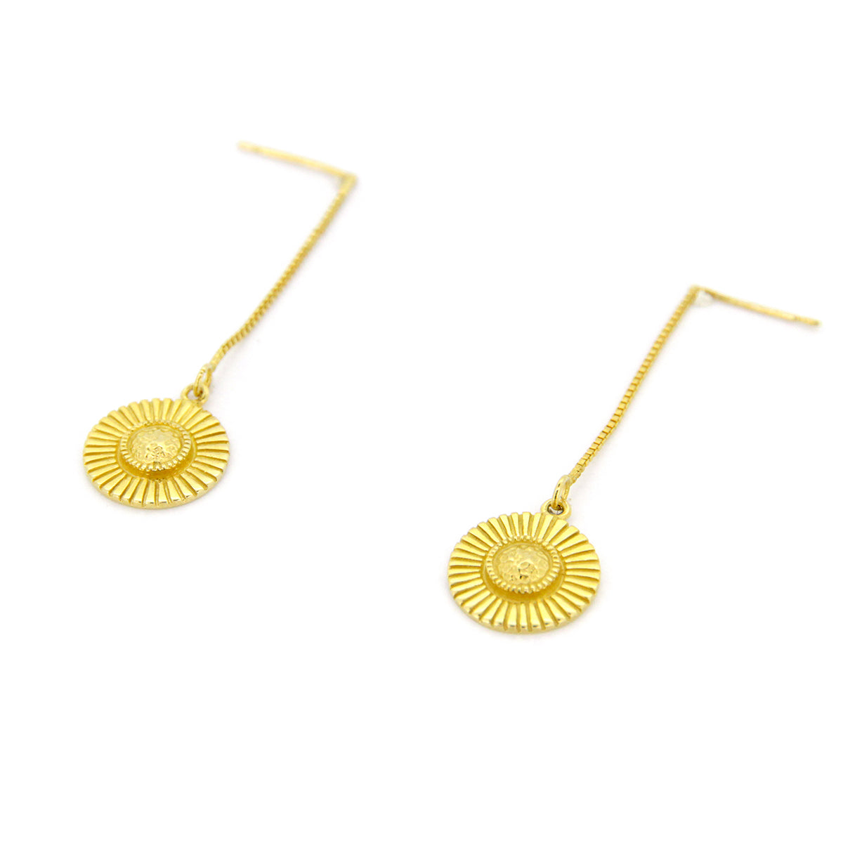 Stylish gold drop earrings with circular, moonshine-like design.