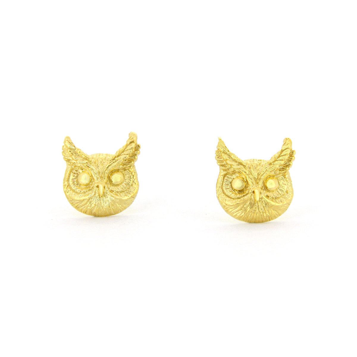 Nature-inspired earrings featuring great horned owl's face design, perfect for animal lovers.