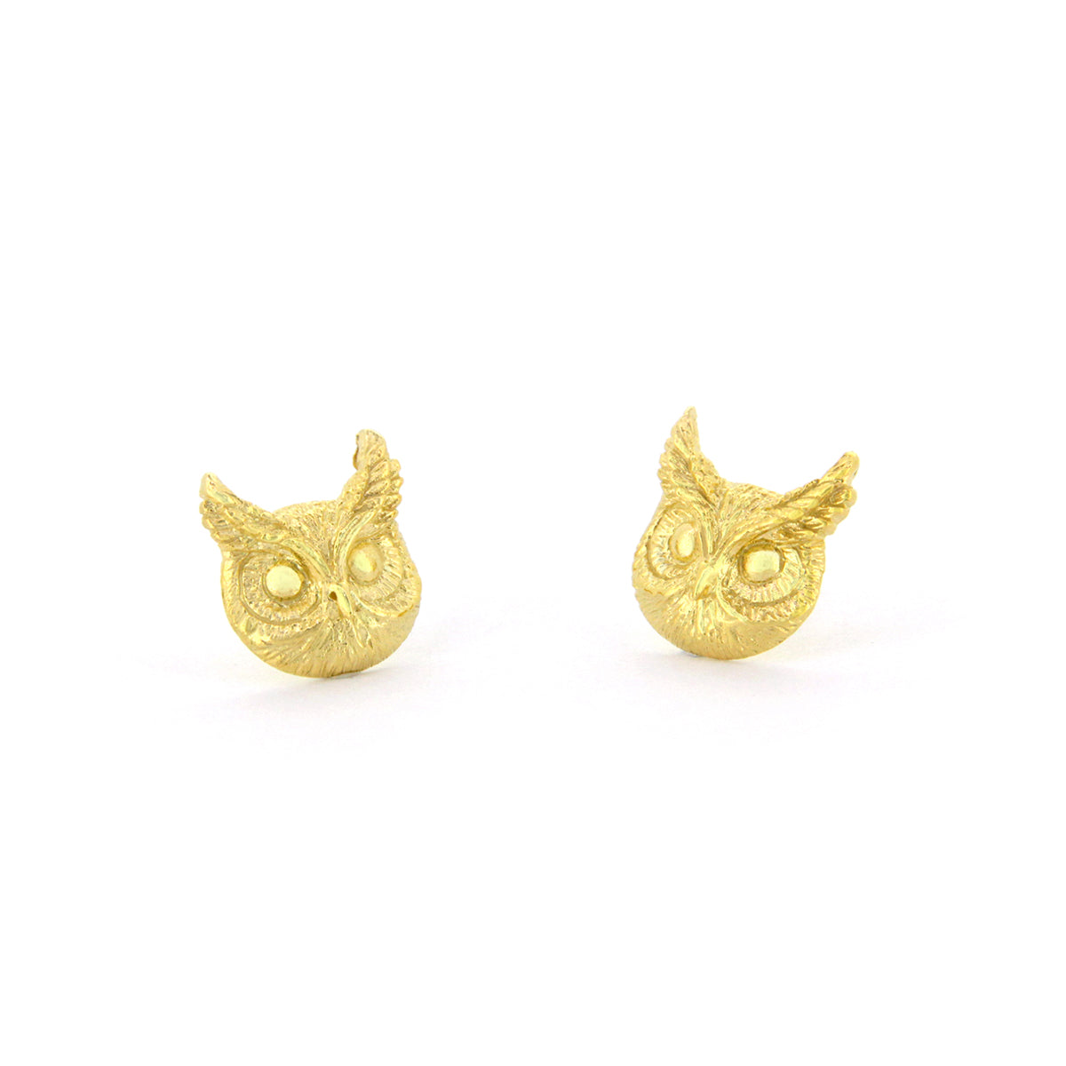 Nature-inspired earrings featuring great horned owl's face design, perfect for animal lovers.