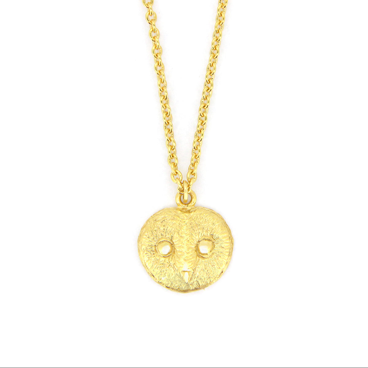 Gold necklace featuring a beautiful pendant with an owl face design