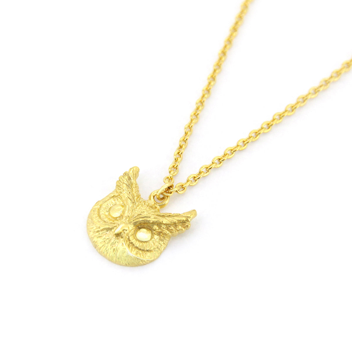 Unique gold owl pendant necklace with on a delicate chain, featuring  intricate details, perfect for animal lovers.