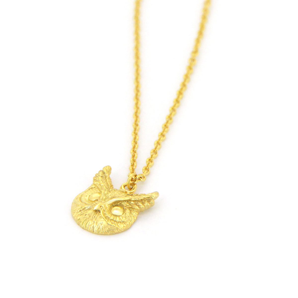 Unique gold owl pendant necklace with on a gold chain, perfect for animal lovers.