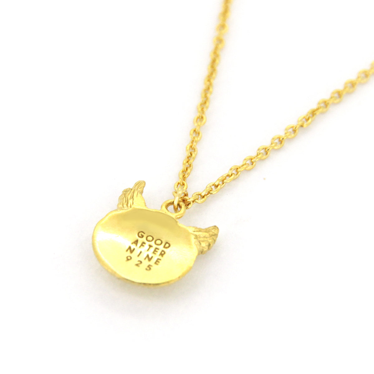 Unique gold owl pendant necklace with on a gold chain, perfect for jewelry lovers.