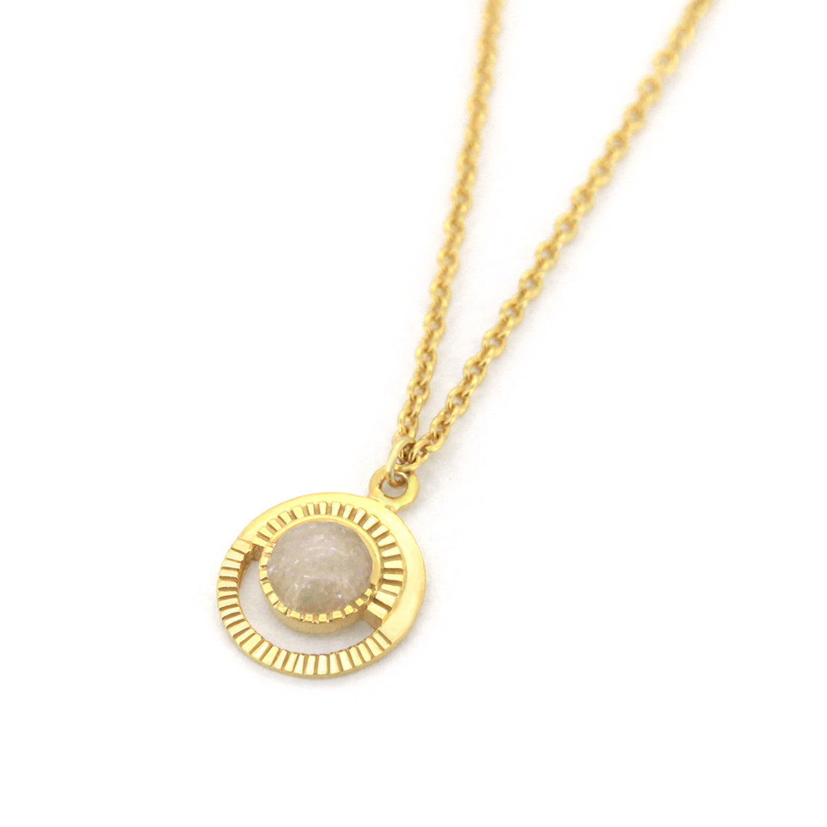 Gold necklace designed with a lunar motif and a beautiful stone centerpiece.