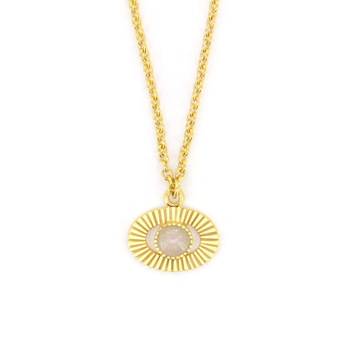 Gold necklace featuring a round pendant with a stone in the center.