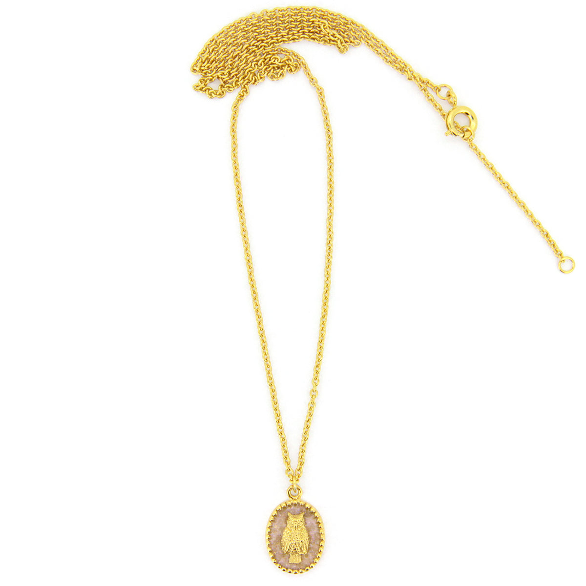 A gold necklace with oval charms showcasing a detailed owl design, perfect for animal lovers.