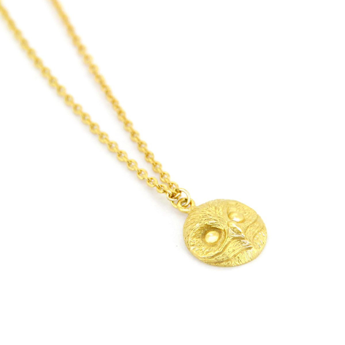 Unique gold necklace featuring an owl pendant