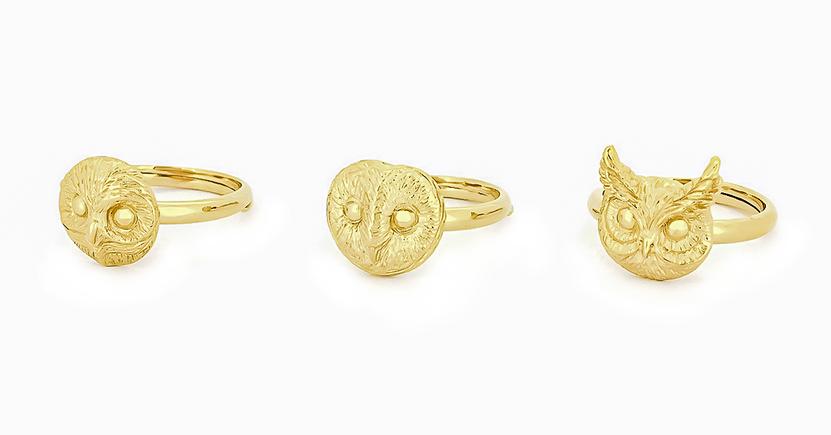 Artisan-crafted gold rings featuring charming owl designs.