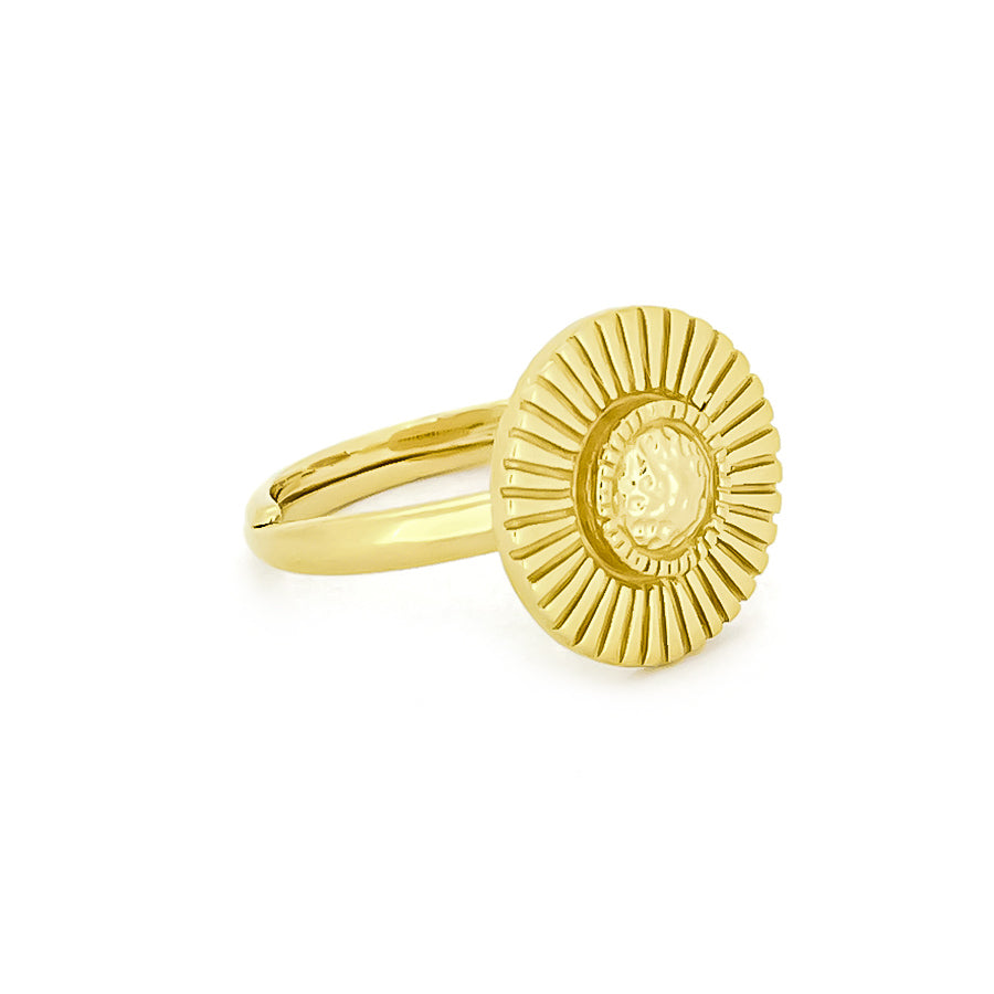 Elegant gold ring with a textured, moon beam design and a central circular element.