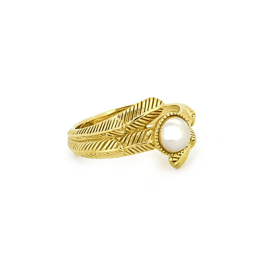 Elegant gold ring featuring intricate feather designs and a costume pearl.