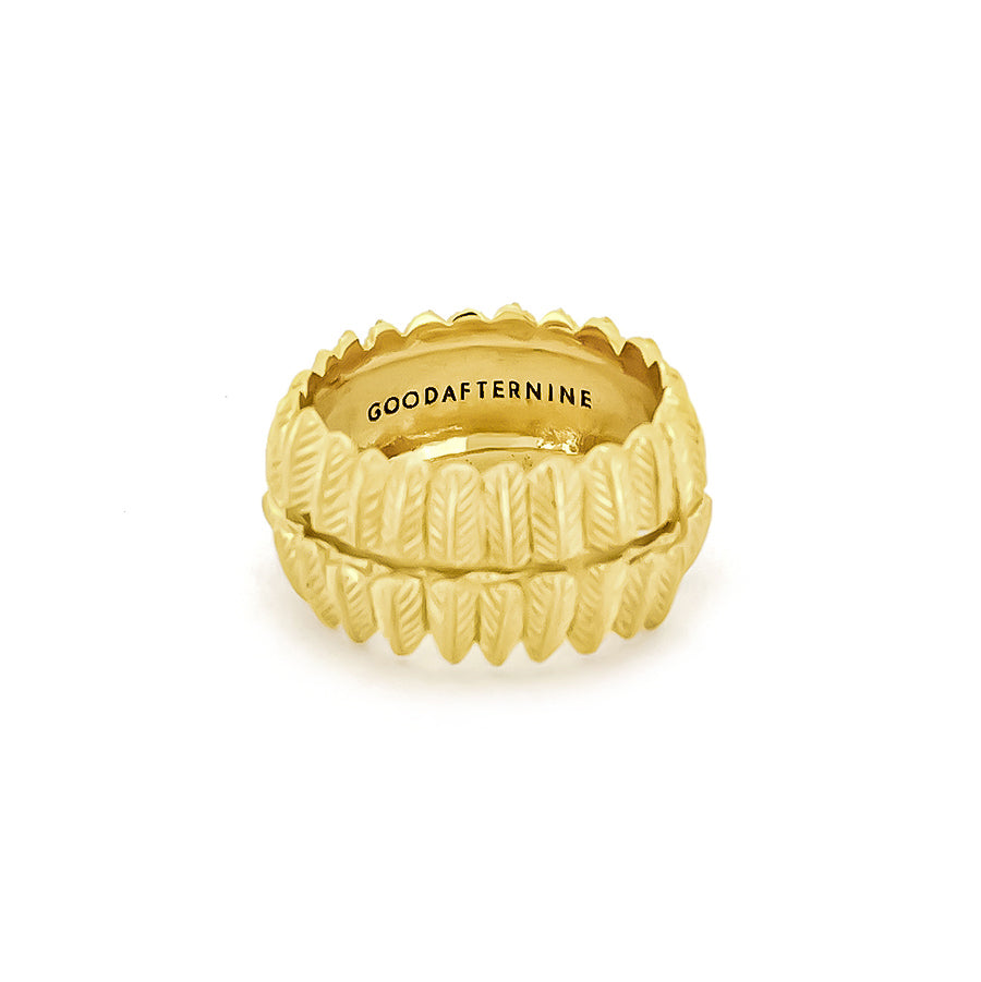 Beautifully crafted gold ring designed with detailed owl feather motifs.