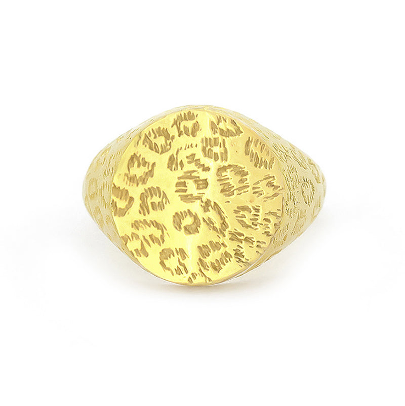 Gold ring with distinct textures featuring a leopard print.