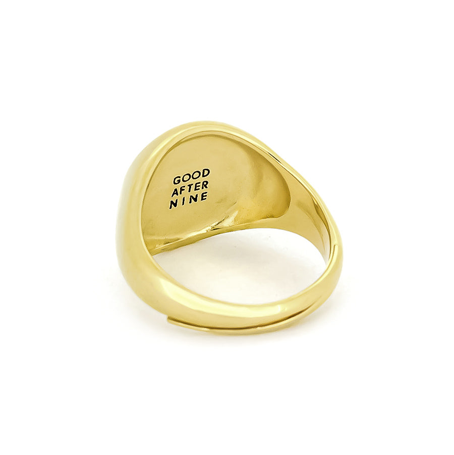 Gold ring with a "GOODAFTERNINE" engraved on the band.